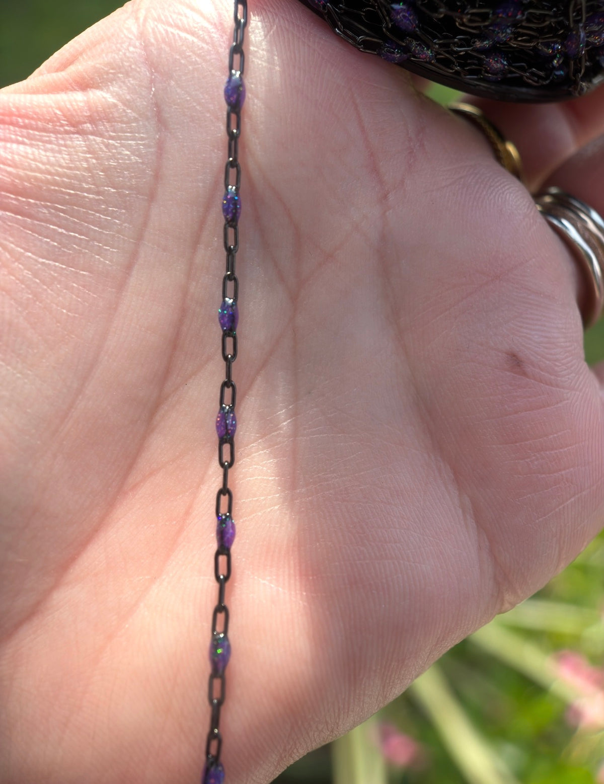 Beyond the Stars: Black Sunburst Galaxy Chain