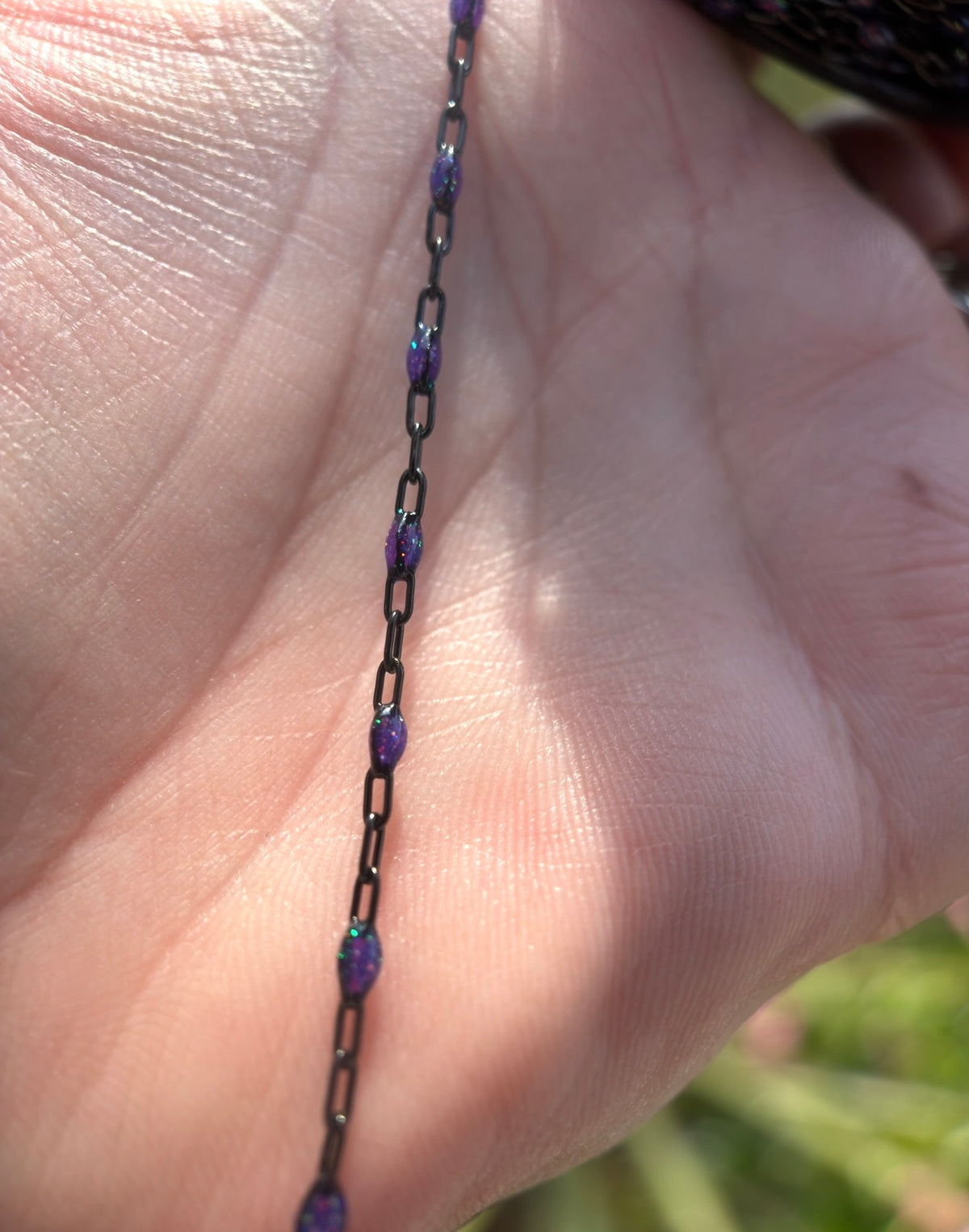 Beyond the Stars: Black Sunburst Galaxy Chain