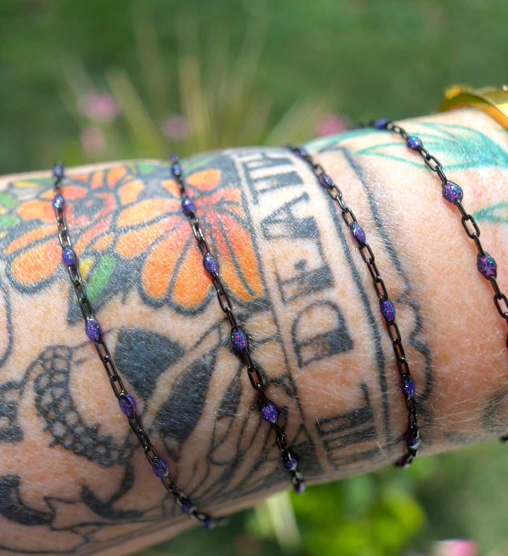 Beyond the Stars: Black Sunburst Galaxy Chain