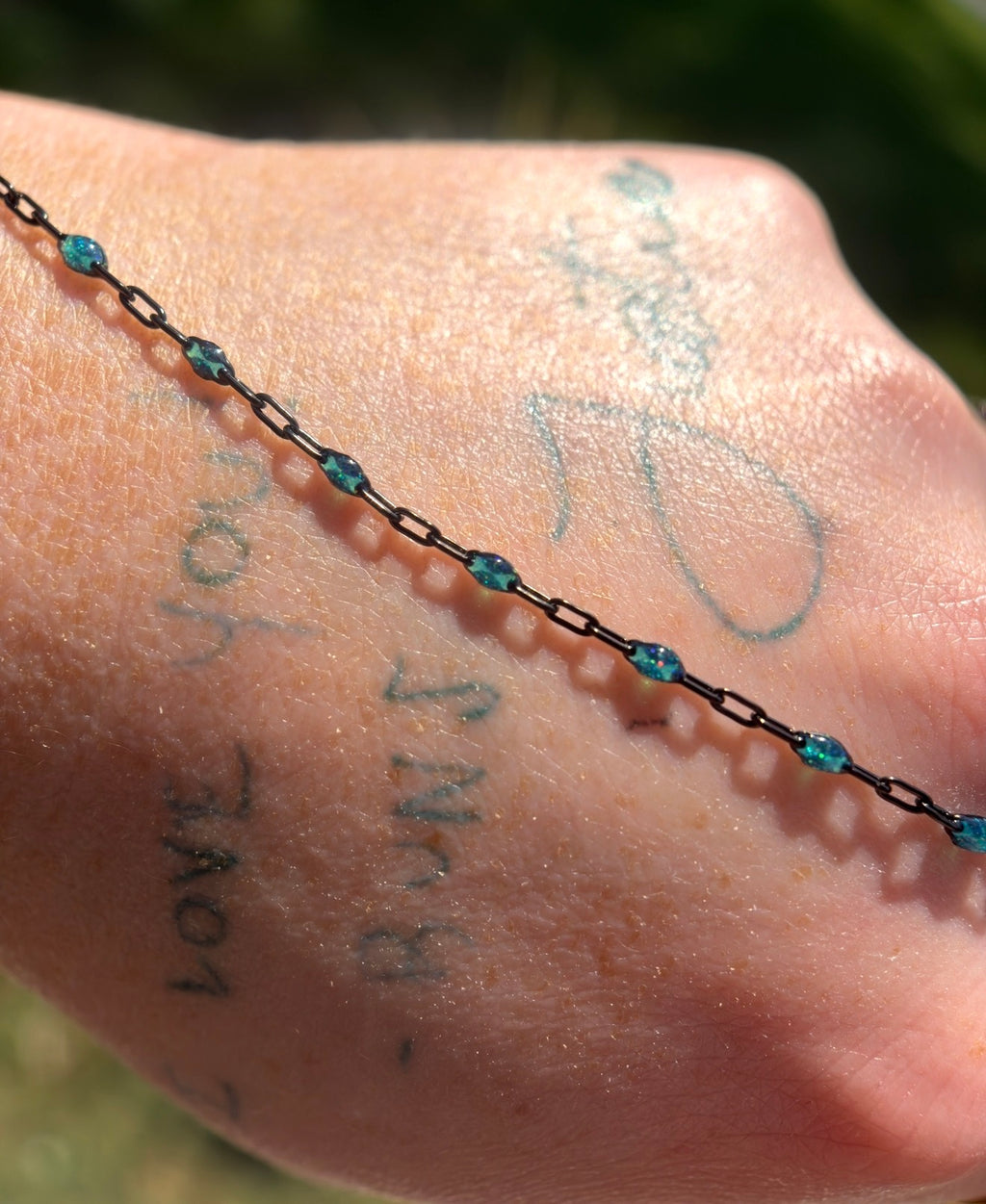 Beyond the Stars: Black Sunburst Galaxy Chain