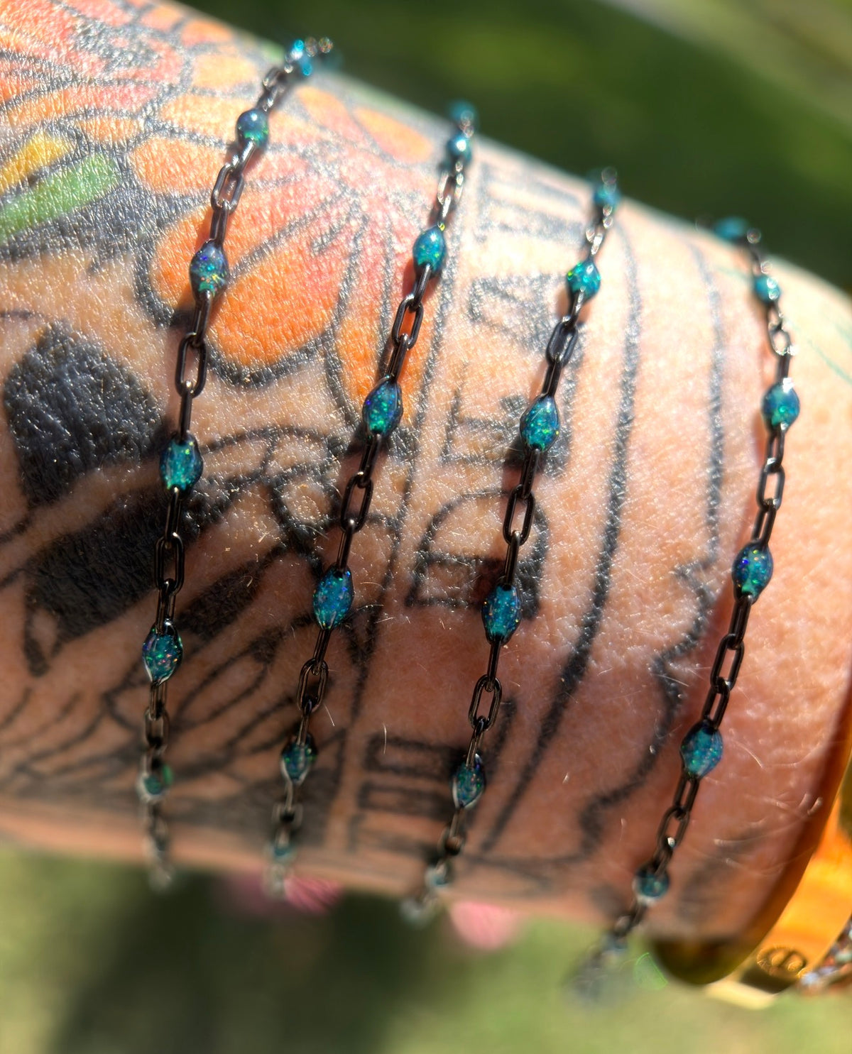 Beyond the Stars: Black Sunburst Galaxy Chain