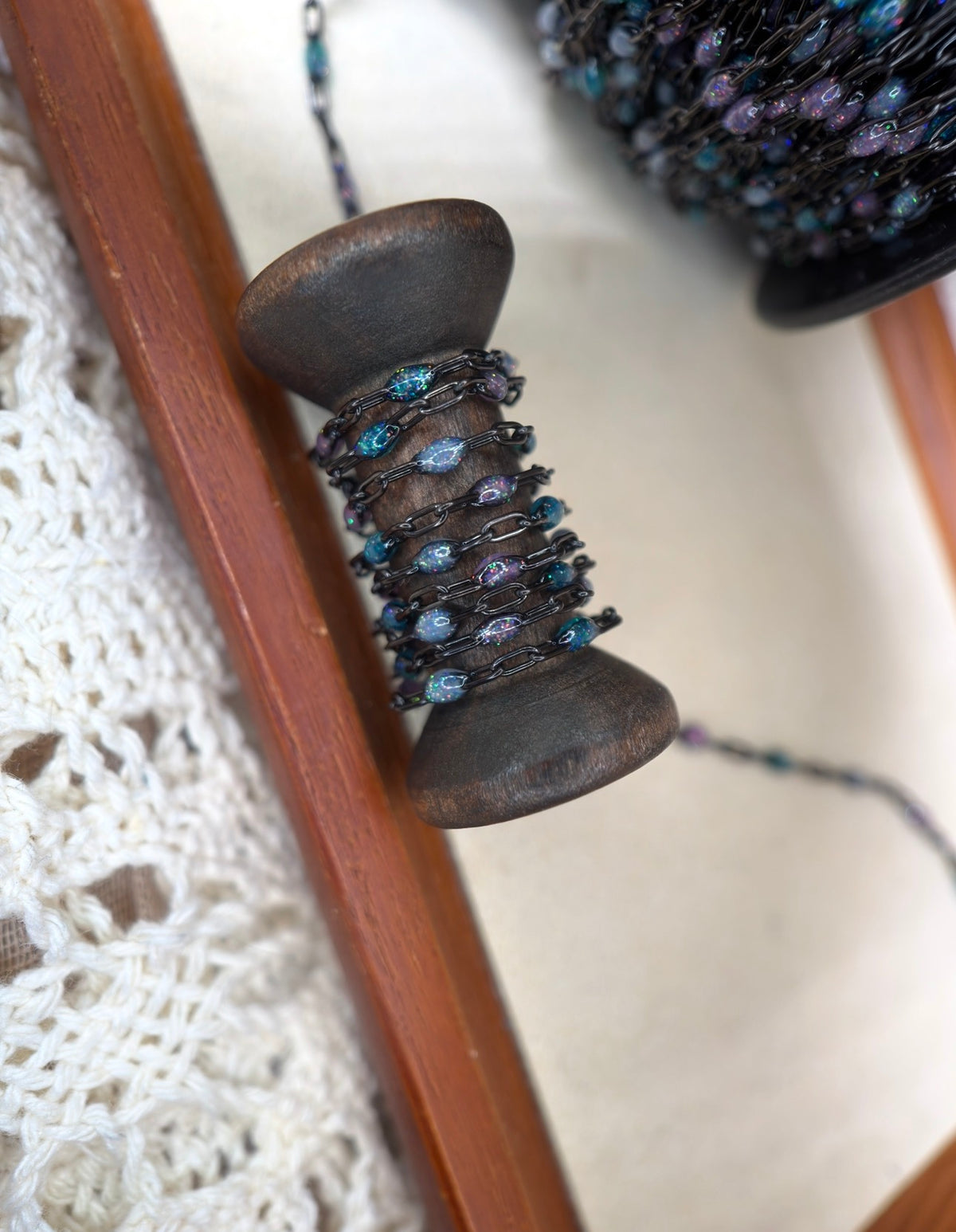 Beyond the Stars: Black Sunburst Galaxy Chain