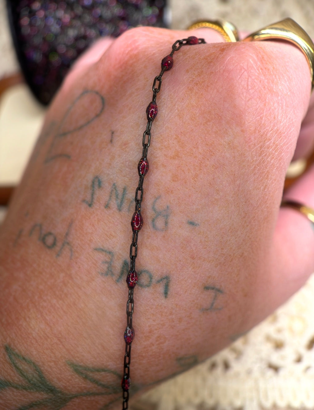Beyond the Stars: Black Sunburst Galaxy Chain