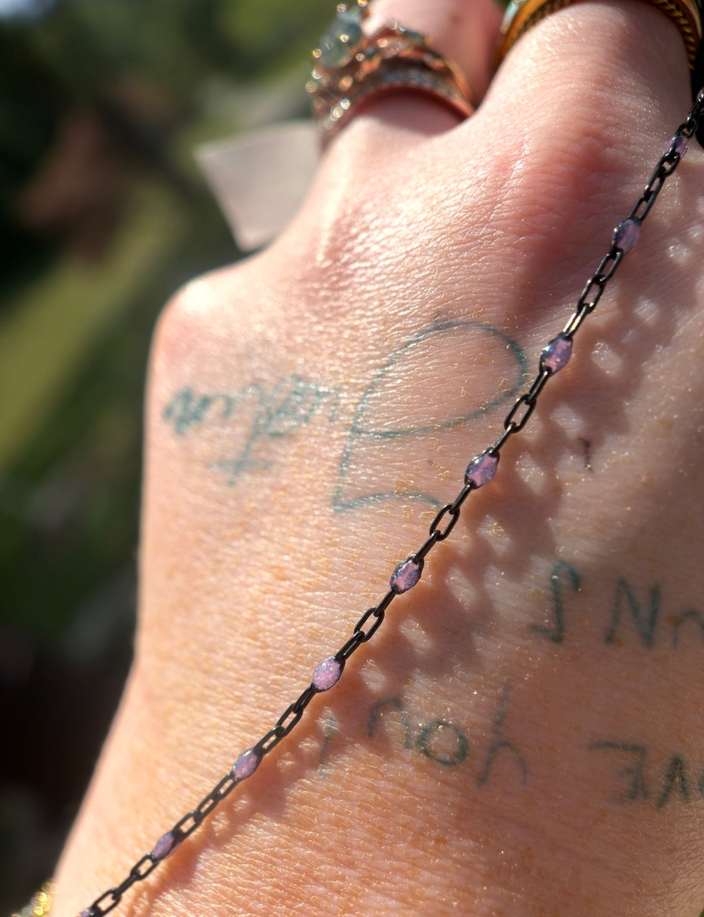 Beyond the Stars: Black Sunburst Galaxy Chain