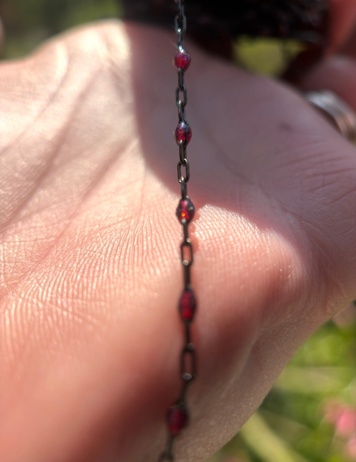 Beyond the Stars: Black Sunburst Galaxy Chain